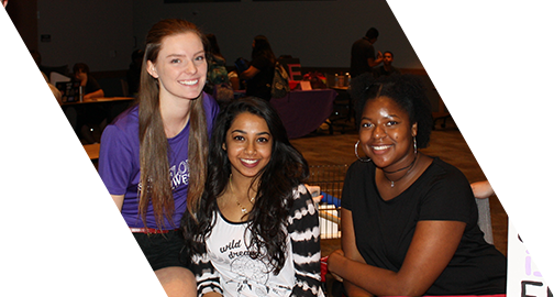 Three students inside building on FSW campus
