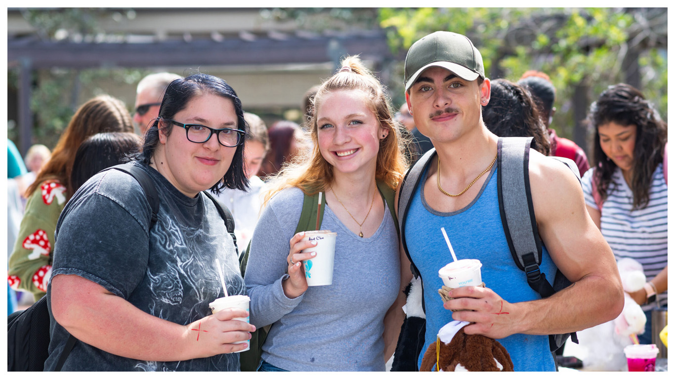 3 FSW students taking a break on campus.