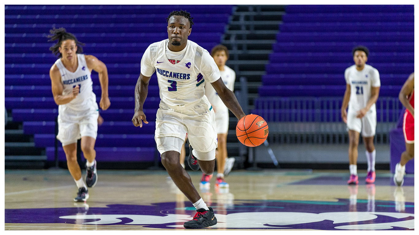 FSW Men's basketball athletes in action.