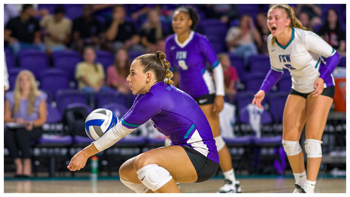 FSW volleyball athletes in action.