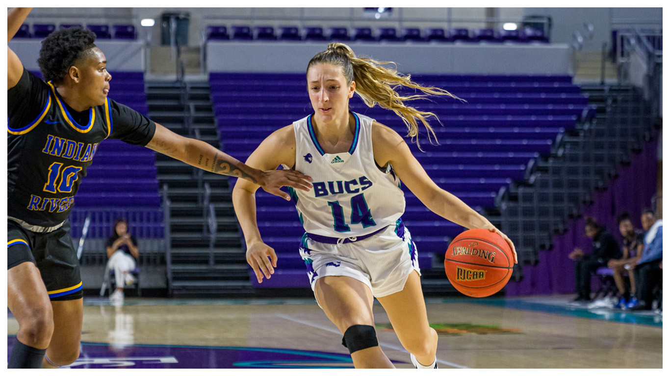 FSW Women's basketball athletes in action.